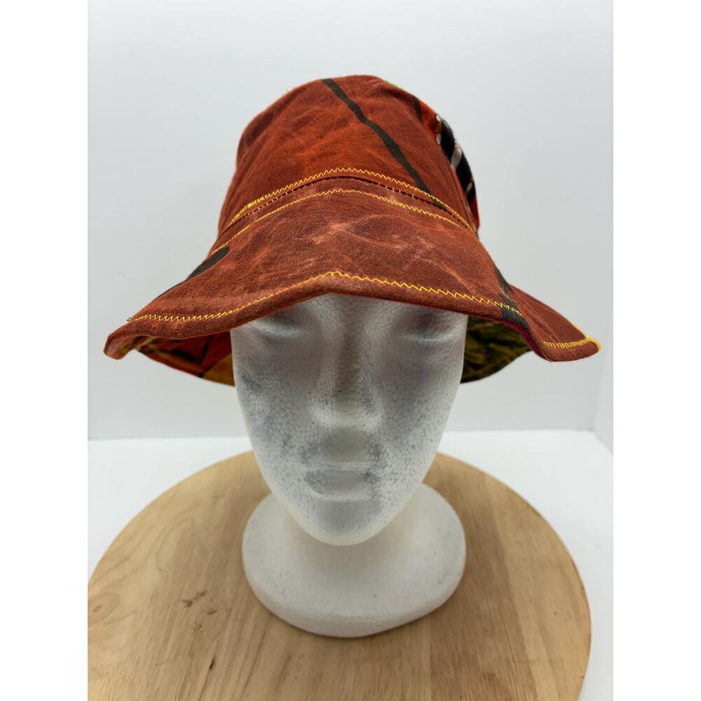 The Motherland — Upcycled African Wax Print Bucket Hat, Emerald Felt Lining
